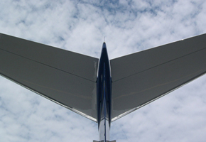 Bates Jet Legacy Aircraft Tail Sky Looking up to corporate management